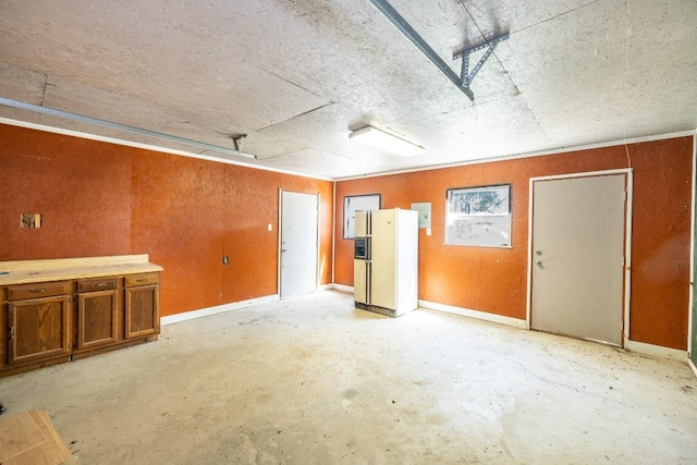 1229 State Highway 304, Gonzales, TX 78629 - garage with white refrigerator with ice dispenser