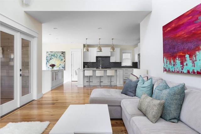 606 E 42nd St, Austin, TX 78751 - living room featuring light wood finished floors