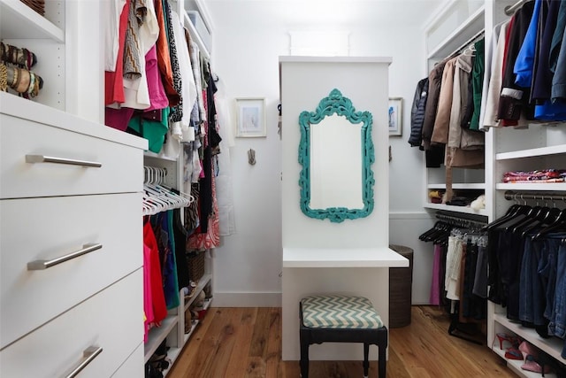 606 E 42nd St, Austin, TX 78751 - spacious closet featuring wood finished floors