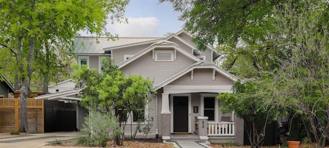 606 E 42nd St, Austin, TX 78751 - view of front of property featuring covered porch and a carport