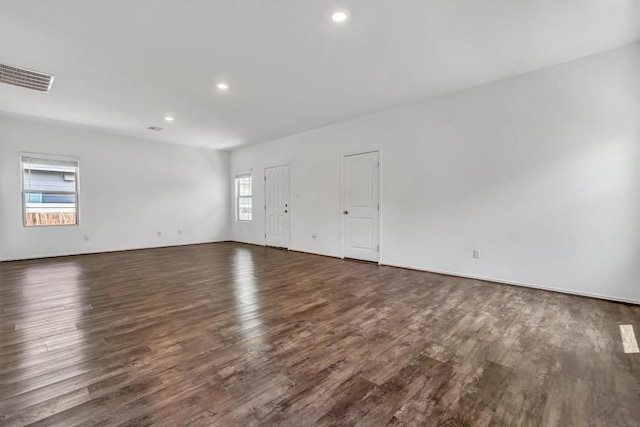 771 Circle Way, Jarrell, TX 76537 - unfurnished room featuring dark wood-type flooring and recessed lighting