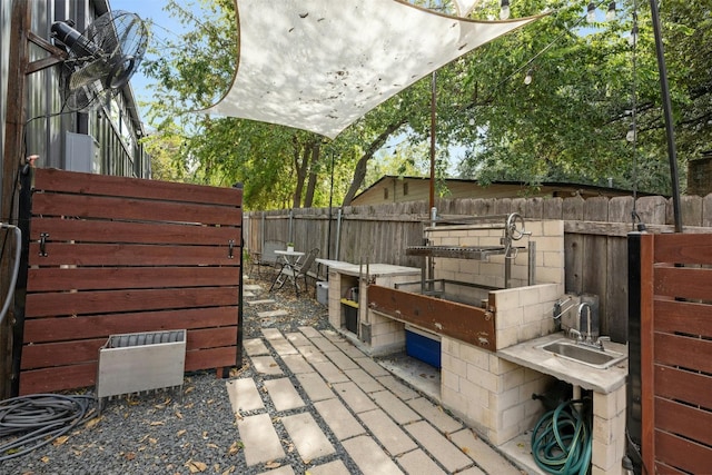 2311 Montclaire St Unit 2, Austin, TX 78704 - view of patio with a sink