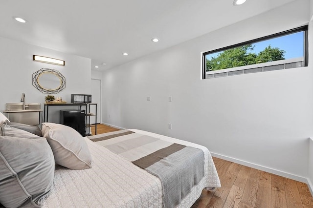 2311 Montclaire St Unit 2, Austin, TX 78704 - bedroom featuring recessed lighting and light wood-style floors