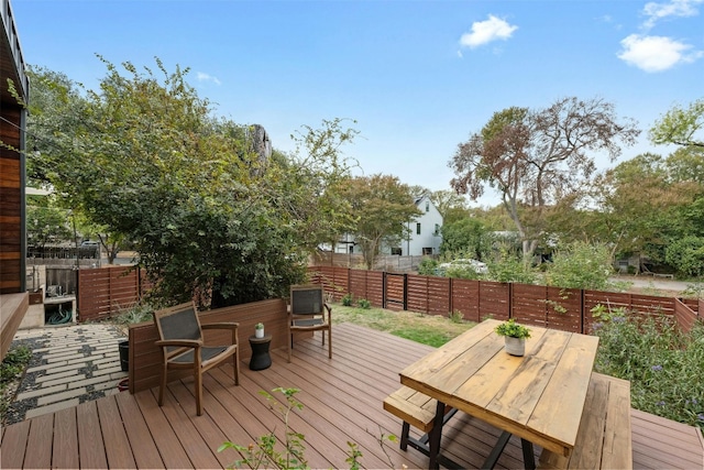 2311 Montclaire St Unit 2, Austin, TX 78704 - wooden terrace with a fenced backyard and outdoor dining space