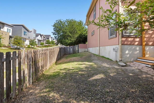 6220 Seville Dr, Austin, TX 78724 - view of yard with a fenced backyard and a residential view