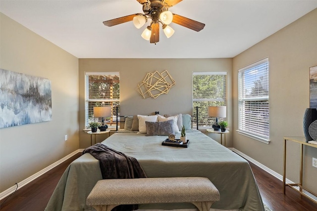 6220 Seville Dr, Austin, TX 78724 - bedroom featuring dark wood finished floors and ceiling fan