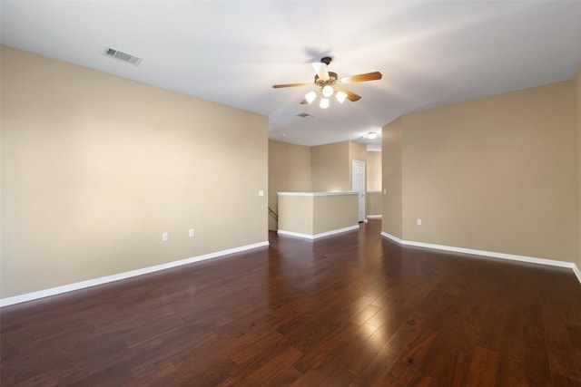 6220 Seville Dr, Austin, TX 78724 - spare room with ceiling fan and dark wood-style flooring