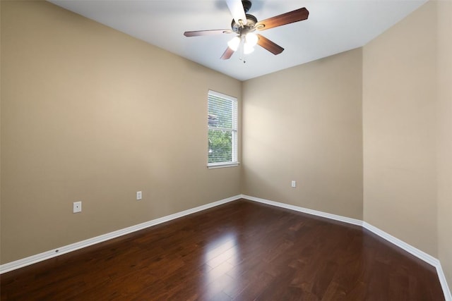 6220 Seville Dr, Austin, TX 78724 - empty room featuring dark wood-style flooring and ceiling fan