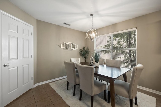 6220 Seville Dr, Austin, TX 78724 - dining room with a chandelier and tile patterned flooring