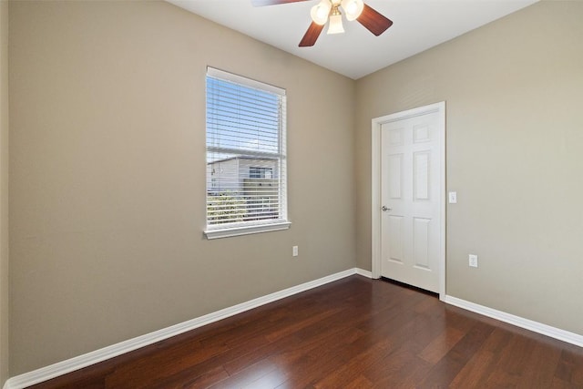 6220 Seville Dr, Austin, TX 78724 - empty room with dark wood-style flooring and ceiling fan