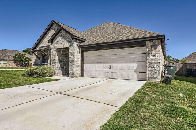 116 Angel Oak Way, San Marcos, TX 78666 - french country style house featuring concrete driveway, a garage, stone siding, and a front lawn