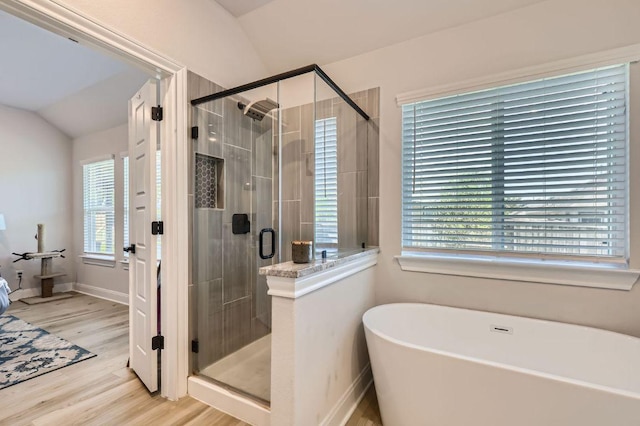 116 Angel Oak Way, San Marcos, TX 78666 - bathroom featuring a shower stall, a soaking tub, and lofted ceiling