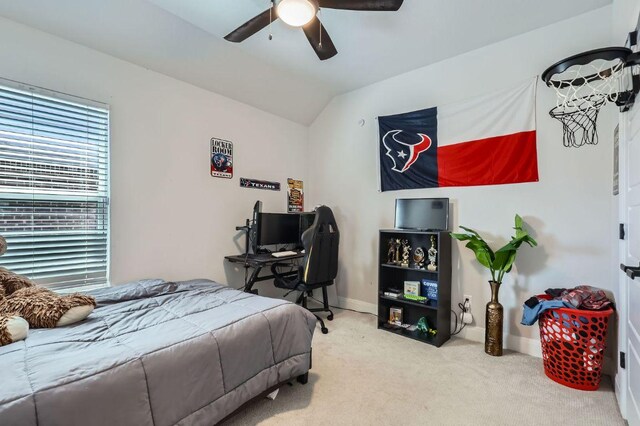 116 Angel Oak Way, San Marcos, TX 78666 - carpeted bedroom featuring baseboards, a ceiling fan, and vaulted ceiling