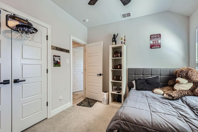 116 Angel Oak Way, San Marcos, TX 78666 - bedroom featuring a ceiling fan, vaulted ceiling, visible vents, carpet floors, and baseboards