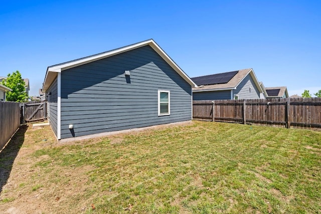 3313 Lodgepole Dr, Austin, TX 78744 - view of home's exterior with a yard and a fenced backyard
