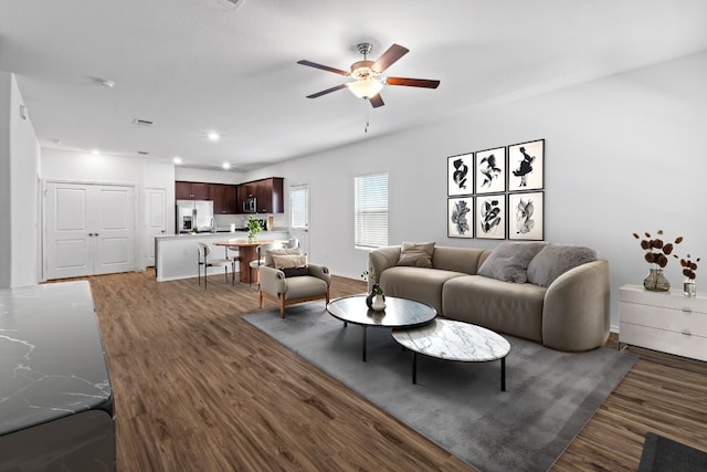 3313 Lodgepole Dr, Austin, TX 78744 - living room featuring wood finished floors, ceiling fan, and recessed lighting