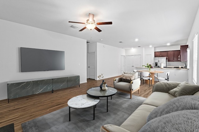 3313 Lodgepole Dr, Austin, TX 78744 - living room with baseboards, recessed lighting, a ceiling fan, visible vents, and wood finished floors