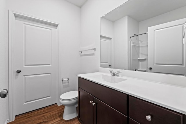 3313 Lodgepole Dr, Austin, TX 78744 - bathroom with toilet, wood finished floors, and vanity