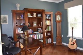 122 Camp Dr, Georgetown, TX 78633 - office with wood finished floors, baseboards, ornamental molding, and decorative columns