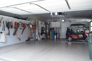 122 Camp Dr, Georgetown, TX 78633 - garage with a garage door opener and gas water heater