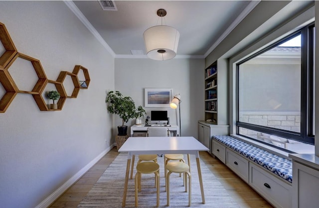 304 Ashburn Cv, Austin, TX 78738 - office area featuring crown molding, light wood finished floors, and baseboards