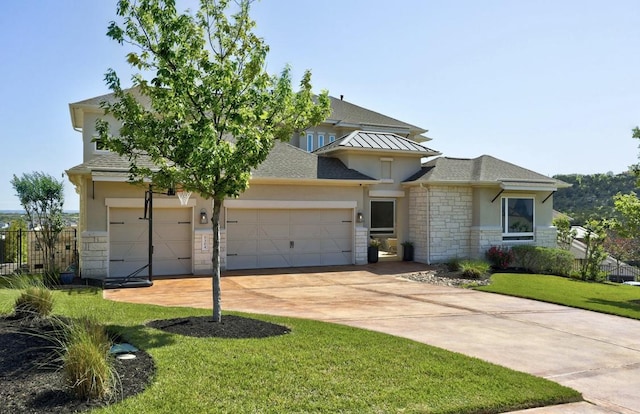 304 Ashburn Cv, Austin, TX 78738 - view of front of home featuring stone siding, stucco siding, concrete driveway, an attached garage, and roof with shingles