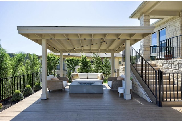 304 Ashburn Cv, Austin, TX 78738 - wooden deck featuring stairway and an outdoor living space with a fire pit
