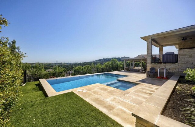 304 Ashburn Cv, Austin, TX 78738 - view of swimming pool featuring ceiling fan, a patio, and a pool with connected hot tub