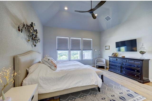304 Ashburn Cv, Austin, TX 78738 - bedroom featuring wood finished floors, lofted ceiling, a ceiling fan, and recessed lighting