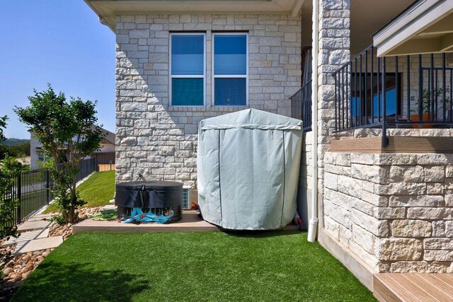 304 Ashburn Cv, Austin, TX 78738 - view of side of home with stone siding