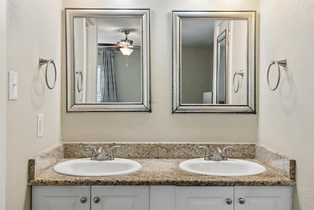 1405 Meadowmear Dr, Austin, TX 78753 - full bath featuring double vanity and a ceiling fan