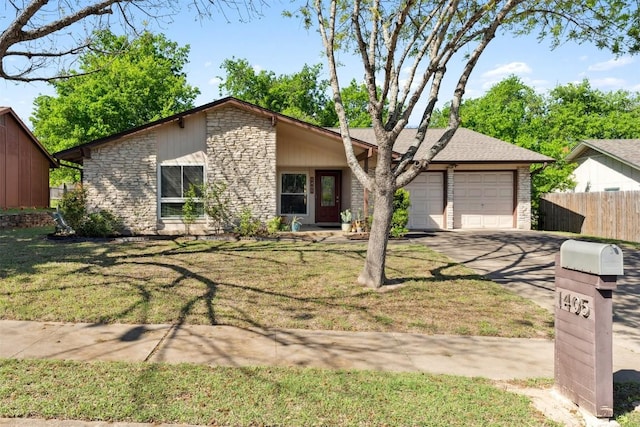 mid-century modern home featuring concrete driveway, a front lawn, fence, and a garage