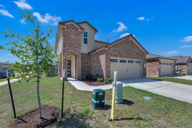 201 Canley Loop, Hutto, TX 78634 - view of front of home featuring brick siding, a garage, a front yard, concrete driveway, and stucco siding