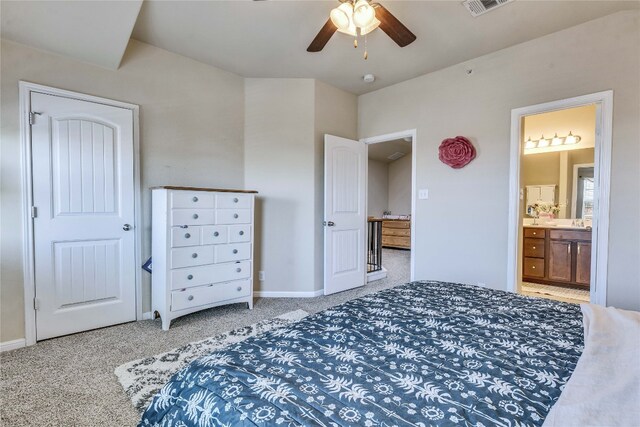 1012 Lost Pines Ln, Cedar Park, TX 78613 - bedroom featuring baseboards, light colored carpet, ensuite bathroom, and ceiling fan