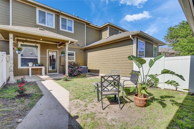 1012 Lost Pines Ln, Cedar Park, TX 78613 - back of house featuring central AC