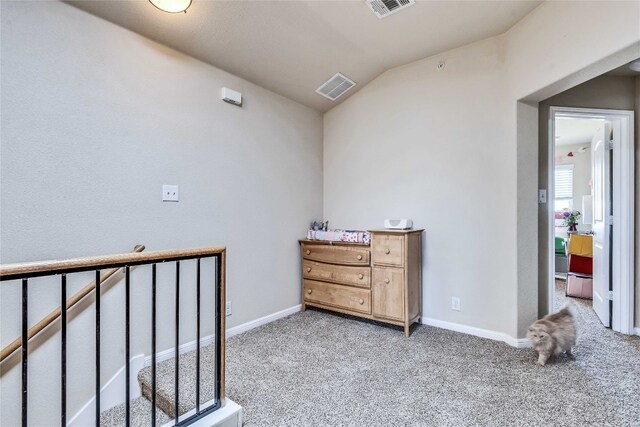 1012 Lost Pines Ln, Cedar Park, TX 78613 - bedroom featuring light carpet, lofted ceiling, and baseboards