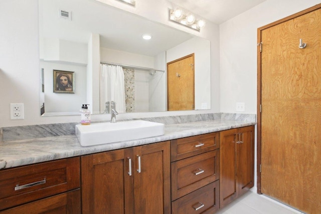 7106 Mountain Trl, Austin, TX 78732 - bathroom with vanity and tile patterned floors