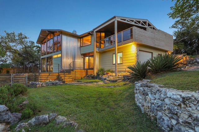 7106 Mountain Trl, Austin, TX 78732 - view of front of home featuring a balcony and an attached garage