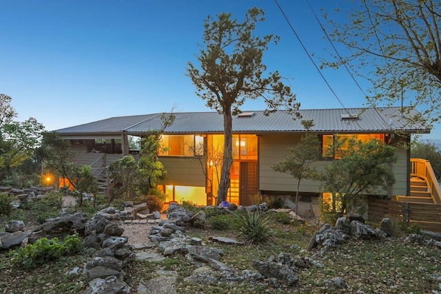 7106 Mountain Trl, Austin, TX 78732 - view of front of home with stairway and a metal roof