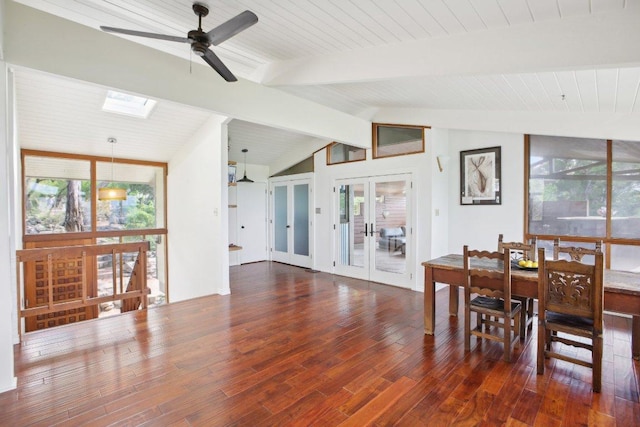 7106 Mountain Trl, Austin, TX 78732 - dining area with wood finished floors, ceiling fan, healthy amount of natural light, and a skylight
