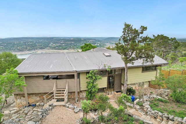 7106 Mountain Trl, Austin, TX 78732 - view of front facade featuring a metal roof