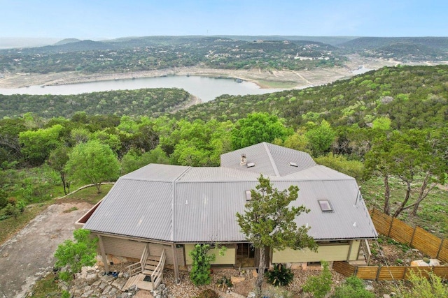 7106 Mountain Trl, Austin, TX 78732 - view of subject property featuring a nearby body of water and a heavily wooded area