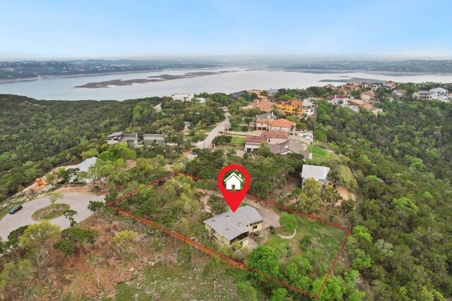 7106 Mountain Trl, Austin, TX 78732 - aerial view of property's location with a nearby body of water and property parcel outlined