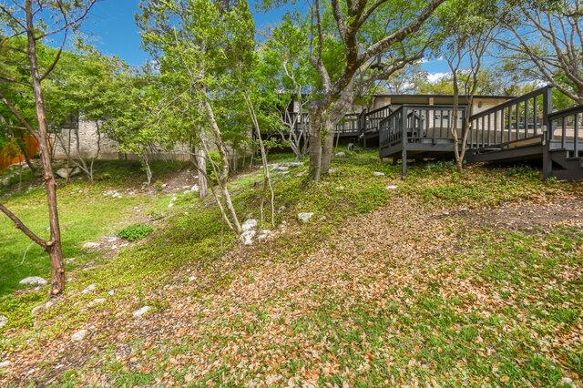 6304 Whitemarsh Valley Walk, Austin, TX 78746 - view of yard with a deck