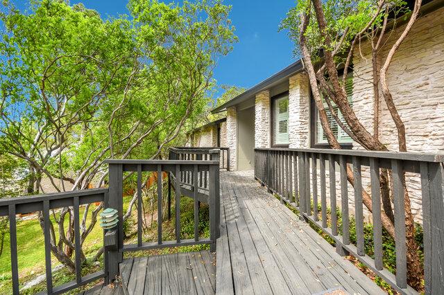 6304 Whitemarsh Valley Walk, Austin, TX 78746 - view of wooden deck