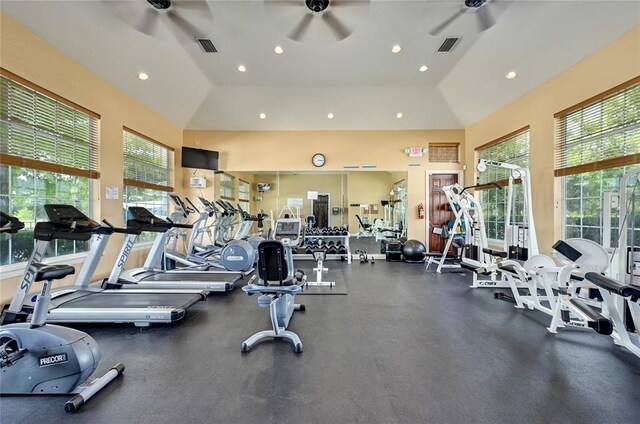 workout area with ceiling fan, a healthy amount of sunlight, and recessed lighting