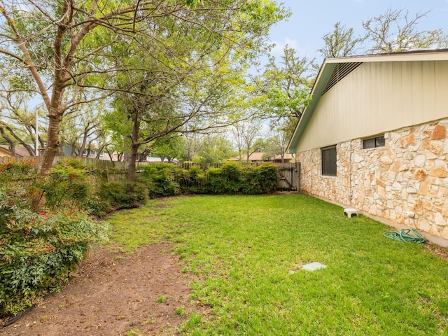 view of yard featuring fence