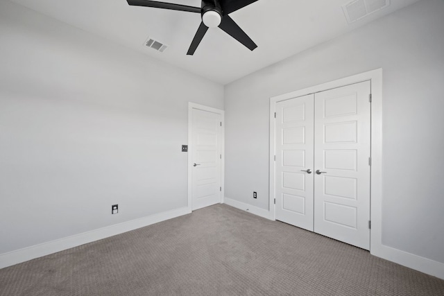 132 Alba Ave, San Marcos, TX 78666 - unfurnished bedroom featuring baseboards, visible vents, carpet, and a closet