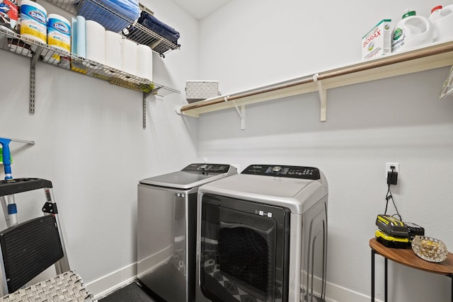132 Alba Ave, San Marcos, TX 78666 - washroom featuring washer and dryer, baseboards, and laundry area