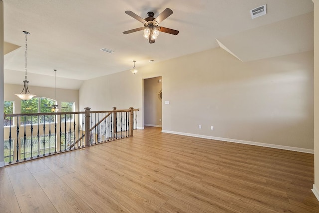 1812 Buffalo Thunder, Leander, TX 78641 - spare room with ceiling fan, light wood-type flooring, baseboards, and vaulted ceiling